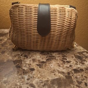 Elegant Tan Woven Crossbody Bag with Black Detail